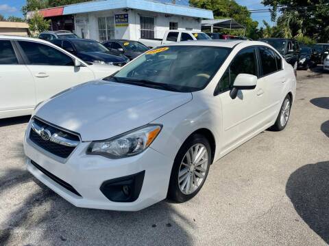 2014 Subaru Impreza for sale at Plus Auto Sales in West Park FL