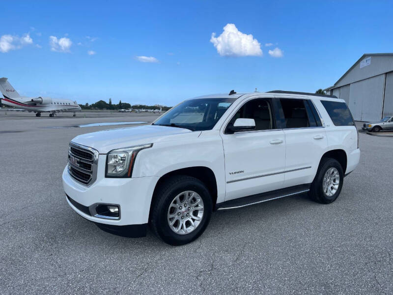 Used 2015 GMC Yukon SLT with VIN 1GKS1BKC8FR193063 for sale in Pompano Beach, FL