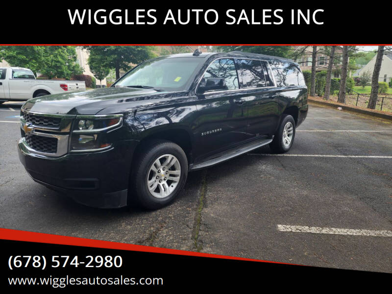 2015 Chevrolet Suburban for sale at WIGGLES AUTO SALES INC in Mableton GA