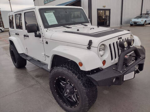 2012 Jeep Wrangler Unlimited for sale at JAVY AUTO SALES in Houston TX