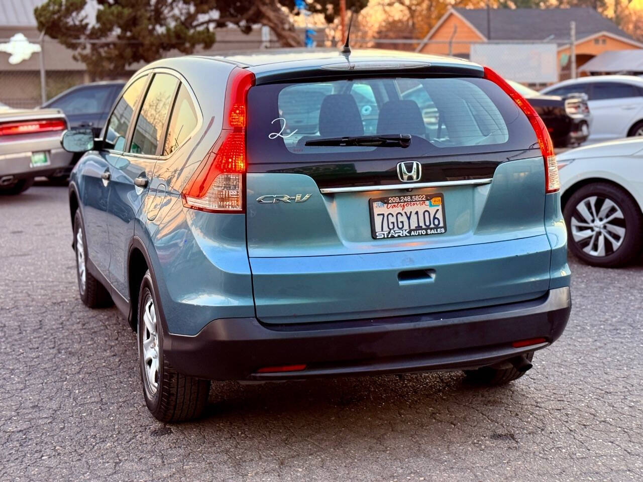 2014 Honda CR-V for sale at STARK AUTO SALES INC in Modesto, CA