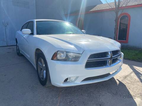 2014 Dodge Charger for sale at Dixie Auto Sales in Houston TX