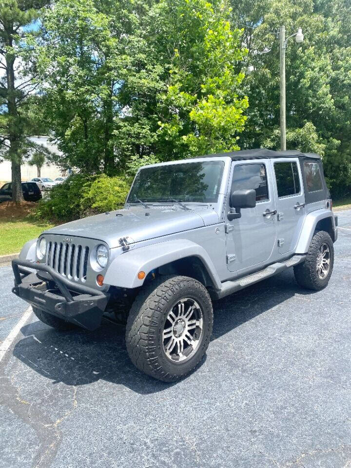 2013 Jeep Wrangler Unlimited for sale at International Car Service, Inc in DULUTH, GA