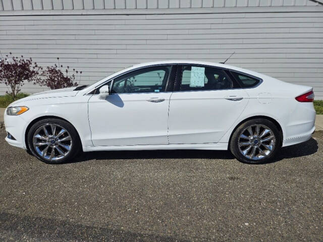 2015 Ford Fusion for sale at BENCHMARK AUTO SALES in Parkland, WA