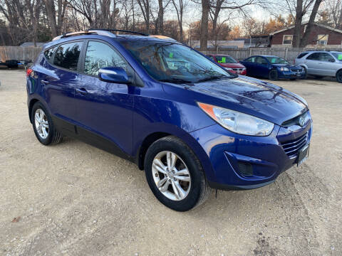 2012 Hyundai Tucson for sale at Northwoods Auto & Truck Sales in Machesney Park IL