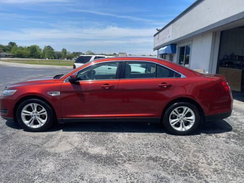 2014 Ford Taurus for sale at ROWE'S QUALITY CARS INC in Bridgeton NC