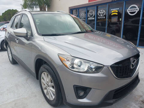 2014 Mazda CX-5 for sale at BestCar in Kissimmee FL