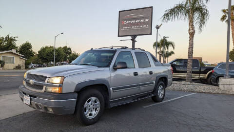 2004 Chevrolet Avalanche for sale at XPRESS MOTORS in Los Banos CA