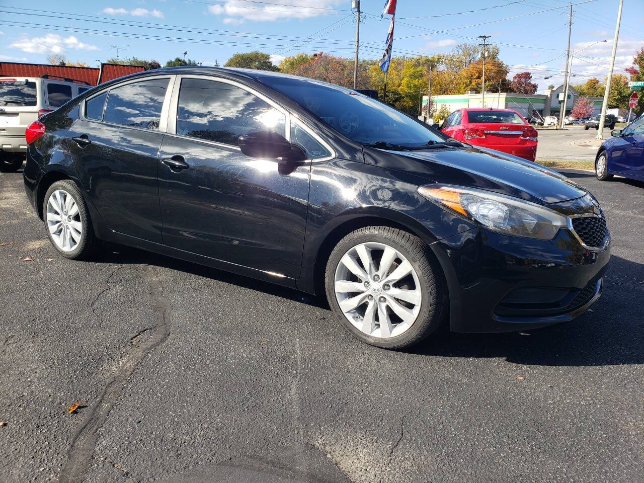 2016 Kia Forte for sale at Auto Shop in Wyoming, MI