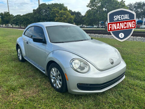2014 Volkswagen Beetle for sale at UNITED AUTO BROKERS in Hollywood FL