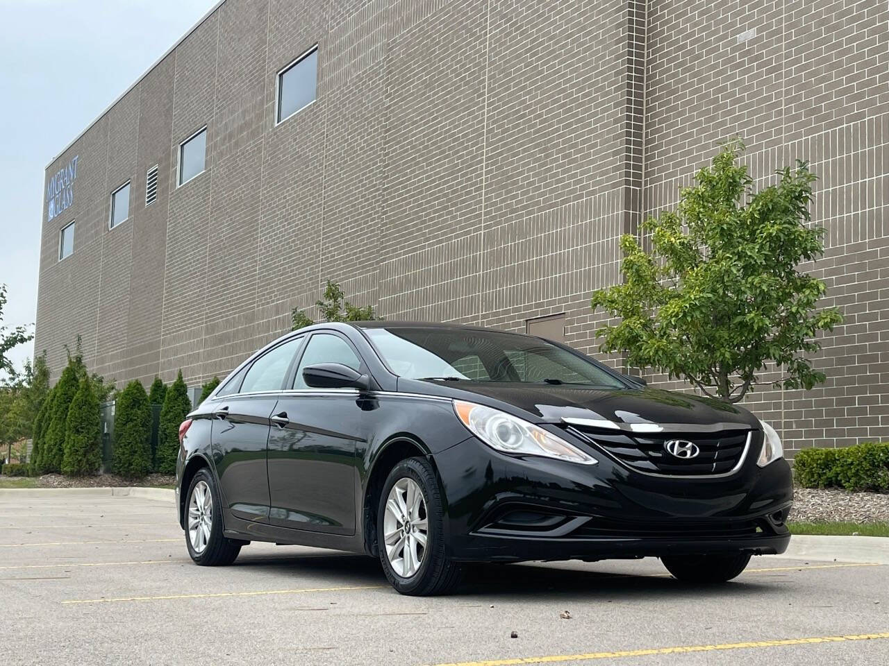 2013 Hyundai SONATA for sale at Phoenix Motor Co in Romulus, MI