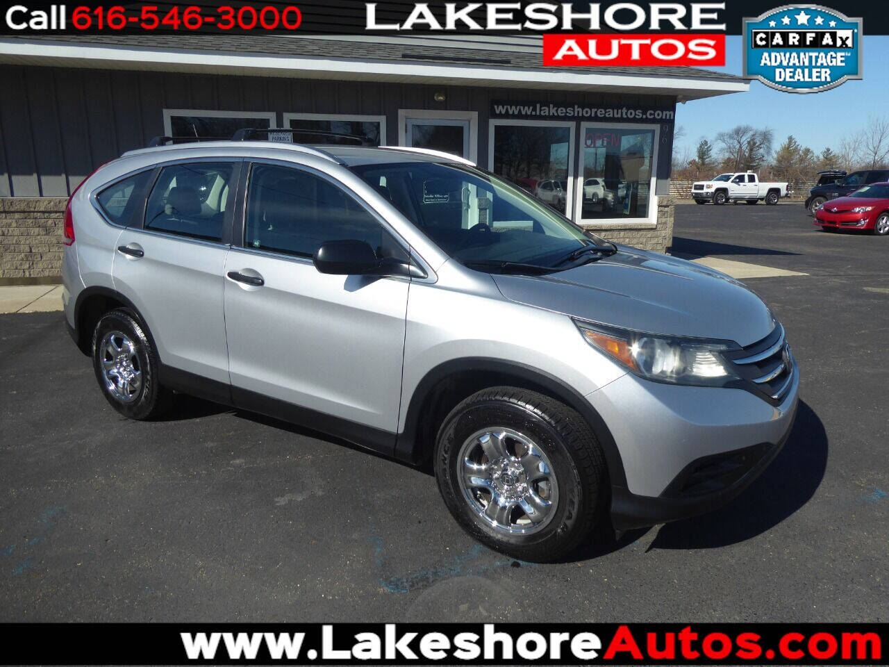 2012 Honda CR-V for sale at Lakeshore Autos in Holland, MI