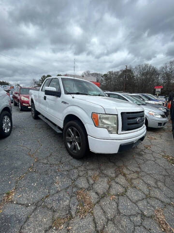 2010 Ford F-150 for sale at LAKE CITY AUTO SALES in Forest Park GA