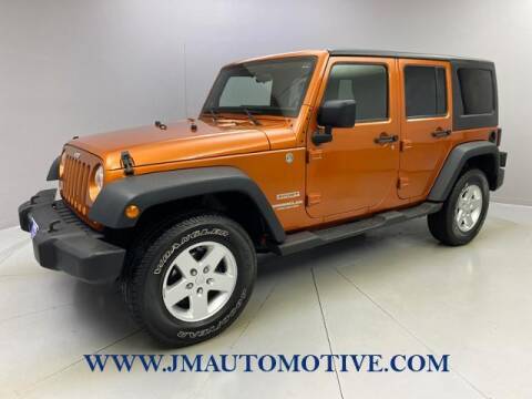 2011 Jeep Wrangler Unlimited for sale at J & M Automotive in Naugatuck CT