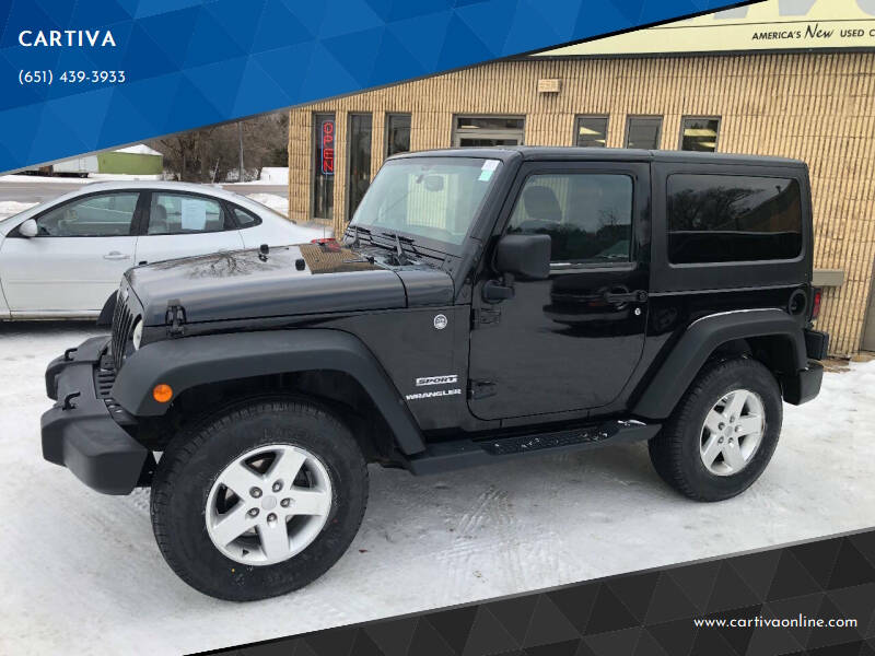 2013 Jeep Wrangler for sale at CARTIVA in Stillwater MN