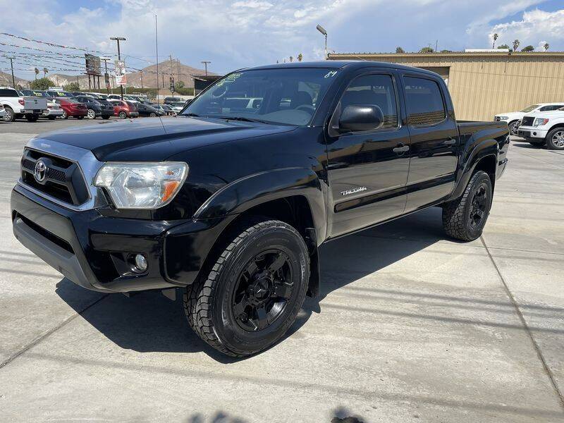 2015 Toyota Tacoma for sale at Los Compadres Auto Sales in Riverside CA