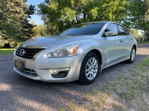 2015 Nissan Altima for sale at BELOW BOOK AUTO SALES in Idaho Falls ID