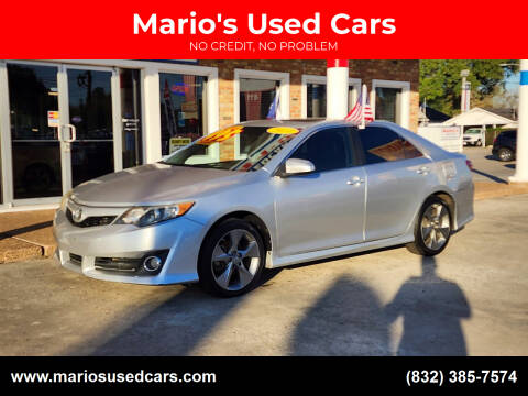 2014 Toyota Camry for sale at Mario's Used Cars - South Houston Location in South Houston TX