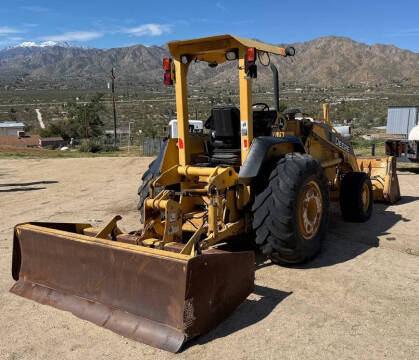 2006 John Deere 210LE