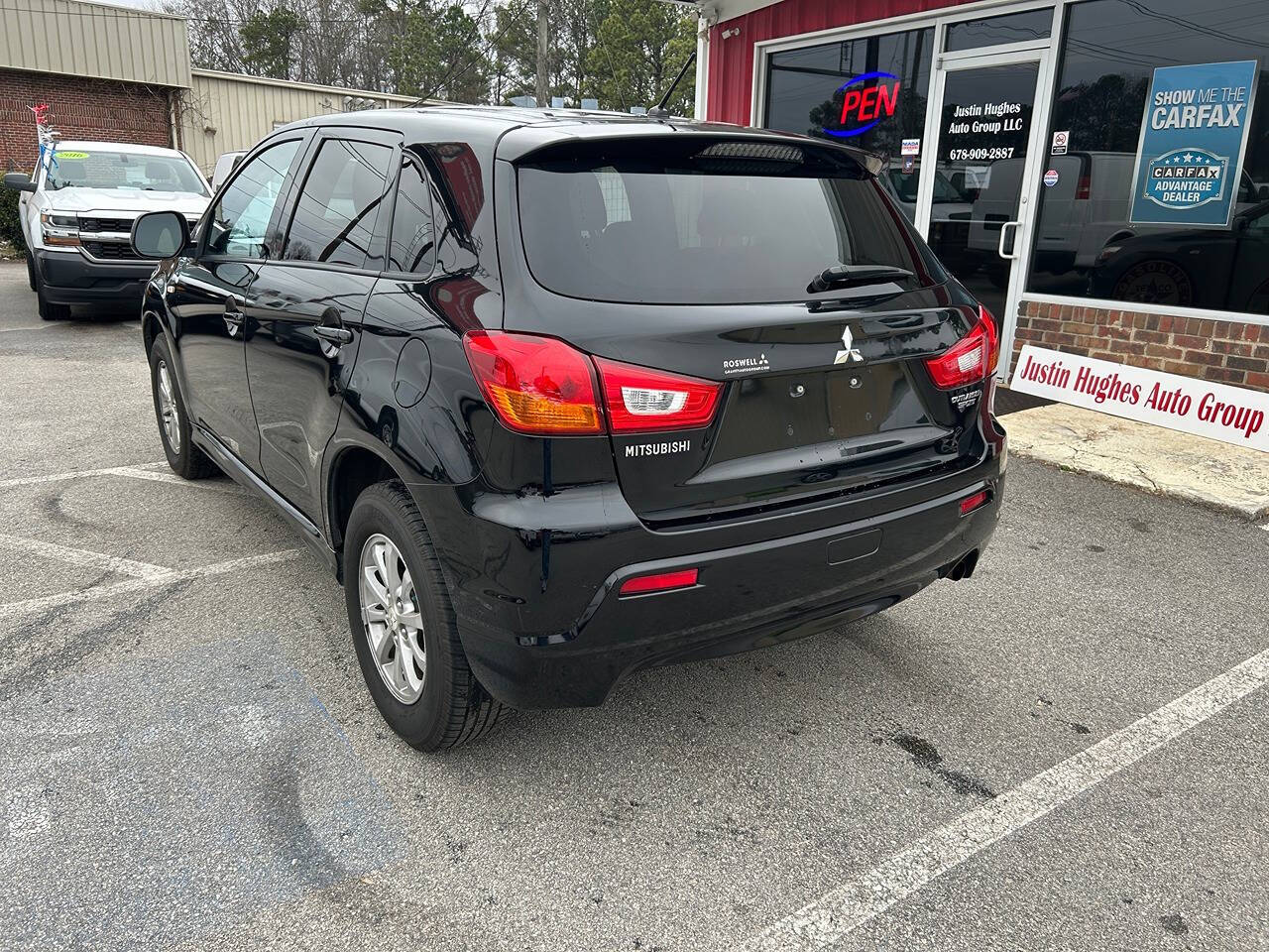 2012 Mitsubishi Outlander Sport for sale at Justin Hughes Auto Group LLC in Douglasville, GA