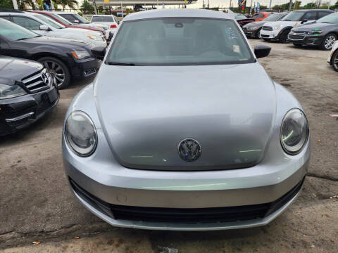 2016 Volkswagen Beetle for sale at America Auto Wholesale Inc in Miami FL