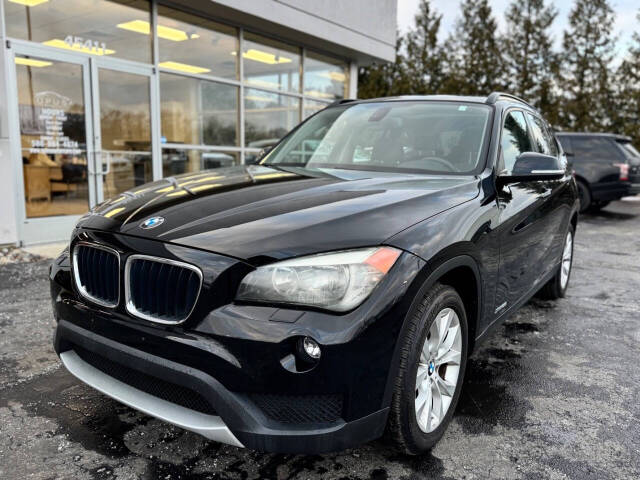 2013 BMW X1 for sale at Opus Motorcars in Utica, MI