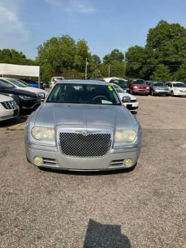2005 Chrysler 300 for sale at Autocom, LLC in Clayton NC