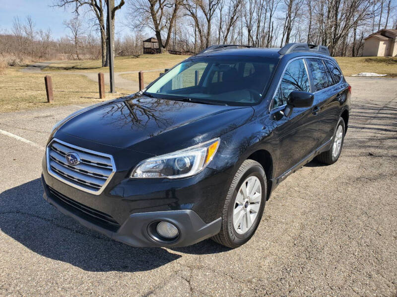 2017 Subaru Outback for sale at COOP'S AFFORDABLE AUTOS LLC in Otsego MI