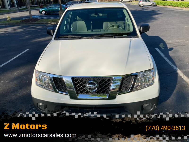 2015 Nissan Frontier for sale at Z Motors in Chamblee GA
