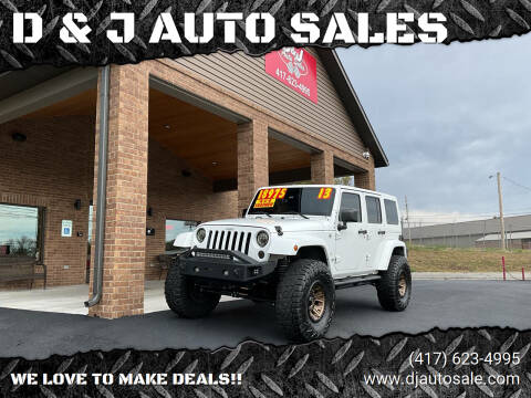 2013 Jeep Wrangler Unlimited for sale at D & J AUTO SALES in Joplin MO