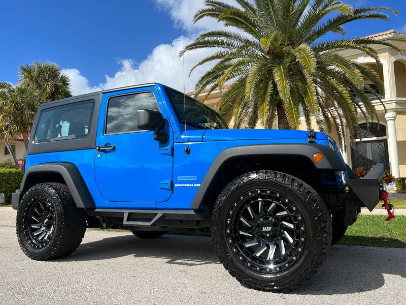 2011 Jeep Wrangler for sale at Exceed Auto Brokers in Lighthouse Point FL