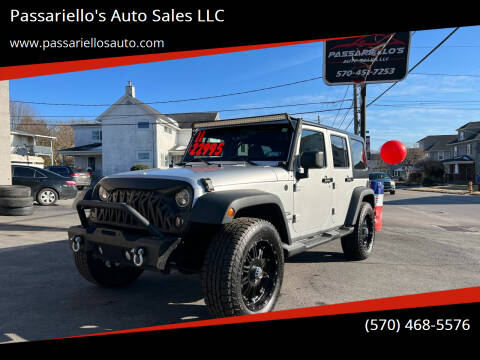 2011 Jeep Wrangler Unlimited for sale at Passariello's Auto Sales LLC in Old Forge PA