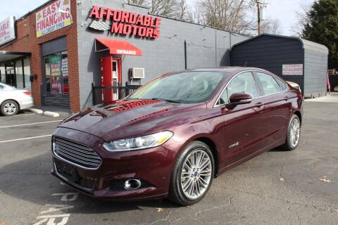 2013 Ford Fusion Hybrid for sale at AFFORDABLE MOTORS INC in Winston Salem NC