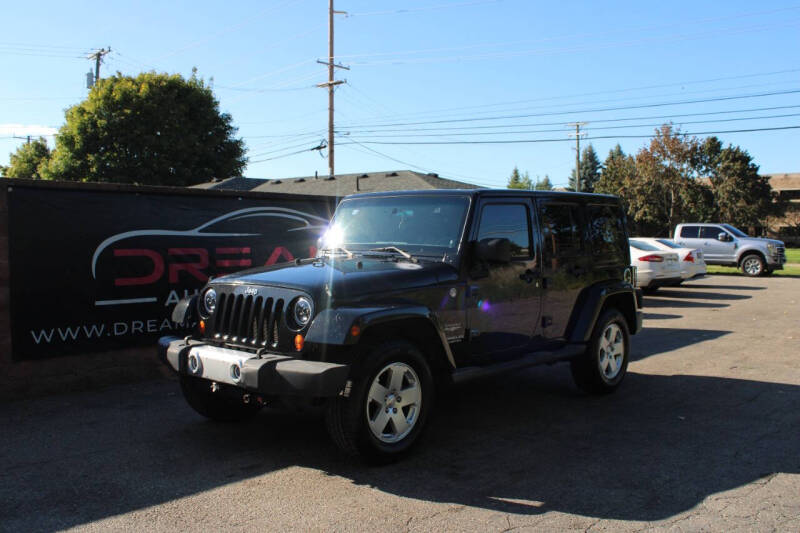 2011 Jeep Wrangler Unlimited for sale at Dream Auto Group in Shelby Township MI