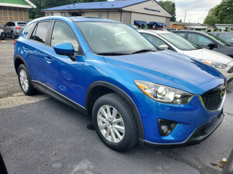 2014 Mazda CX-5 for sale at Topham Automotive Inc. in Middleboro MA