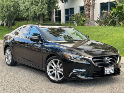 2016 Mazda MAZDA6 for sale at MILLENNIUM MOTORS in Van Nuys CA