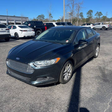 2014 Ford Fusion for sale at D & G AUTO SALES in Dothan AL