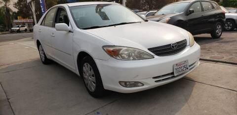 2003 Toyota Camry for sale at LUCKY MTRS in Pomona CA