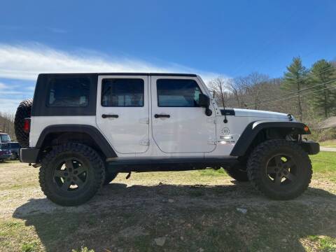 2012 Jeep Wrangler Unlimited for sale at LEE'S USED CARS INC Morehead in Morehead KY