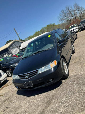 2004 Honda Odyssey for sale at Autocom, LLC in Clayton NC