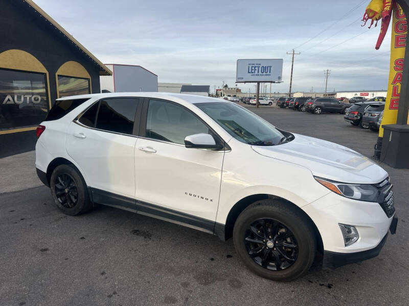 2021 Chevrolet Equinox for sale at BELOW BOOK AUTO SALES in Idaho Falls ID