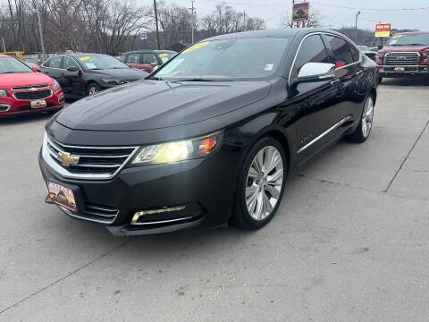 2014 Chevrolet Impala for sale at Azteca Auto Sales LLC in Des Moines IA