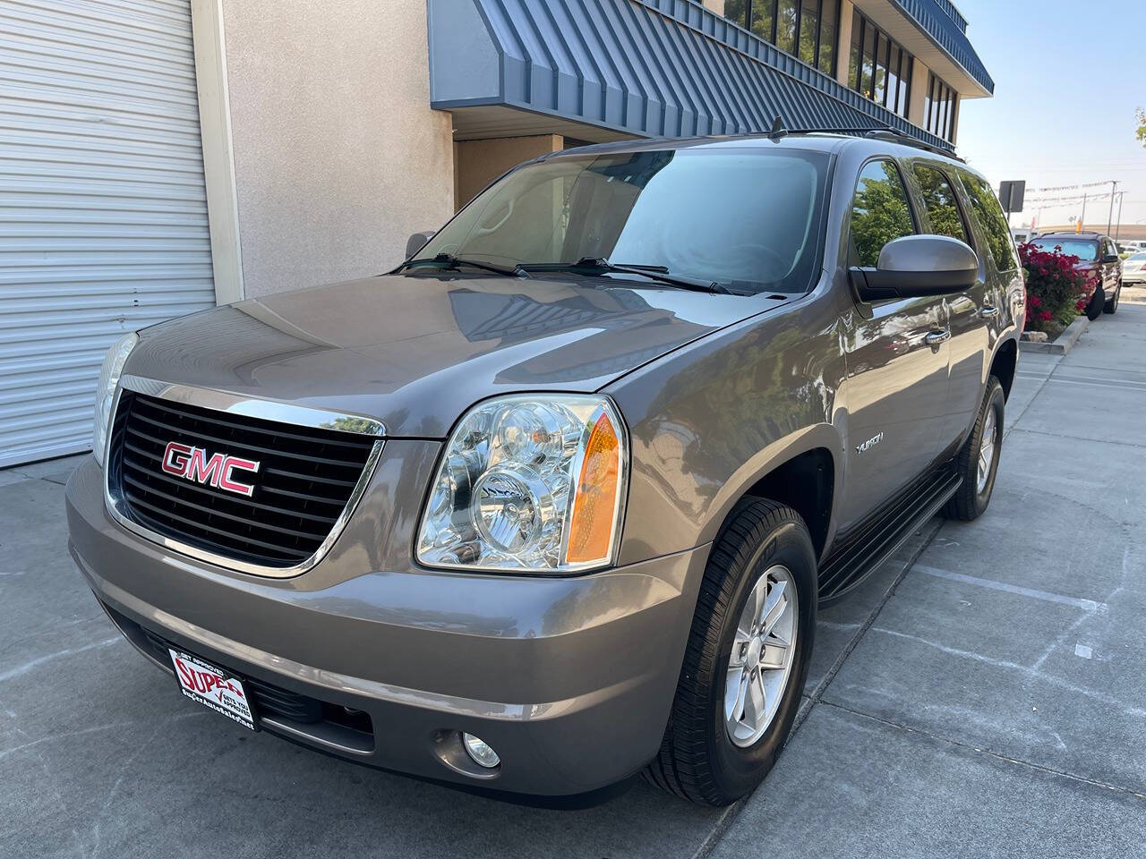 2014 GMC Yukon for sale at Super Auto Sales Modesto in Modesto, CA