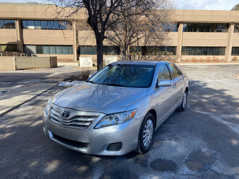 2011 Toyota Camry for sale at QUEST MOTORS in Englewood CO