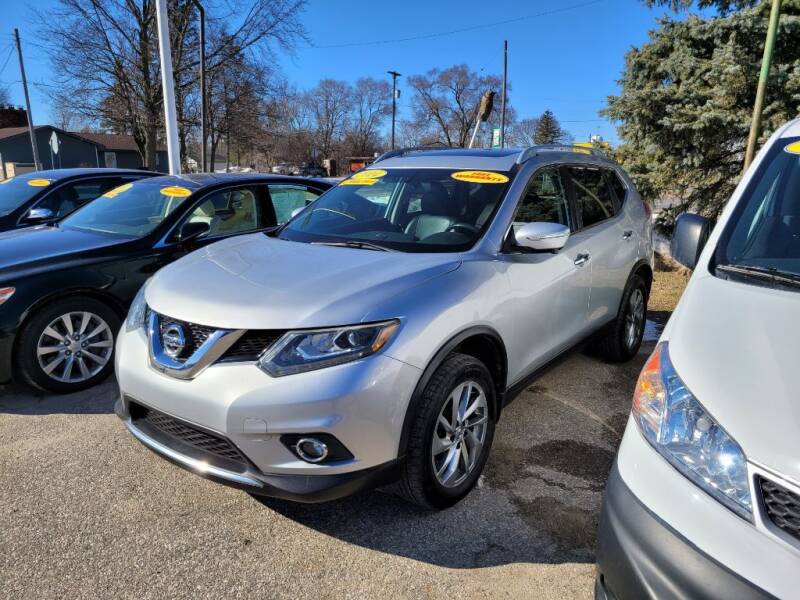 2014 Nissan Rogue for sale at Clare Auto Sales, Inc. in Clare MI
