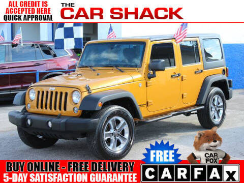 2014 Jeep Wrangler Unlimited for sale at The Car Shack in Hialeah FL