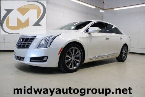 2013 Cadillac XTS for sale at Midway Auto Group in Addison TX