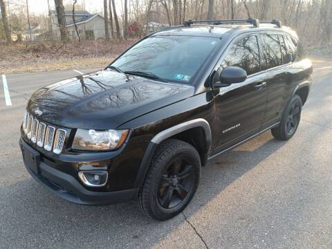 2016 Jeep Compass for sale at Rombaugh's Auto Sales in Battle Creek MI