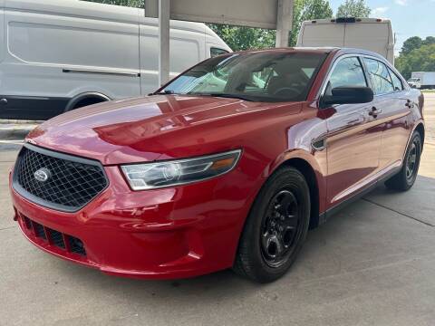 2015 Ford Taurus for sale at Capital Motors in Raleigh NC