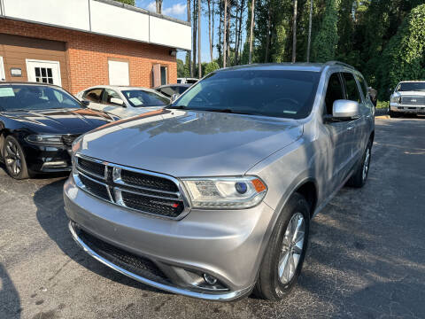 2014 Dodge Durango for sale at Magic Motors Inc. in Snellville GA